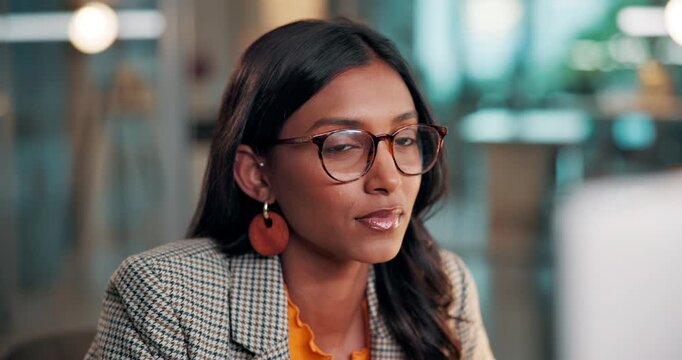 Reading, review or woman in office with computer, draft edit or source feedback for article. Digital, glasses or Indian journalist in agency with tech, fact check or industry research for publication