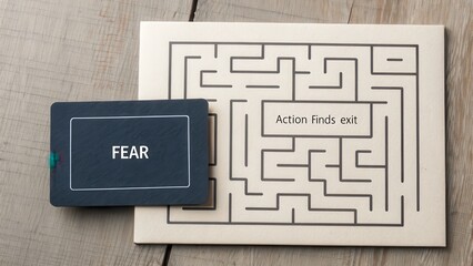 Abstract diagram with a maze and labeled concept of fear and action