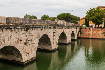The Bridge of Tiberius over the Marecchia river in Rimini, Italy