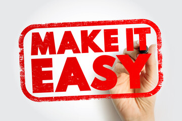 MAKE IT EASY stamp with hand holding marker, motivation concept, simplify life and reduce stress, inspiration for success and focus