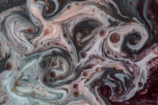 Macro abstract pattern of fluid mix in neutral tones. Artistic background with swirling shapes and soft contrasts