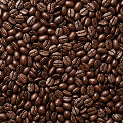Obraz premium Full frame texture background of fresh roasted dark brown coffee beans, top down view