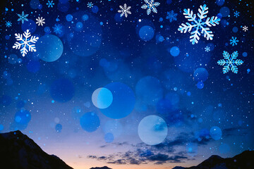 Winter night sky with snowflakes and glowing orbs