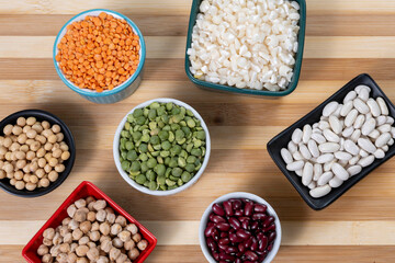 several pots with raw grains for preparing healthy food
