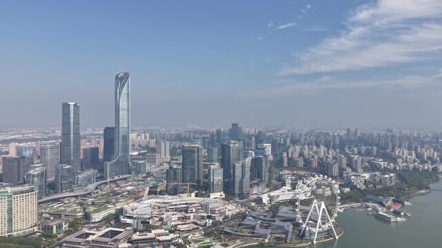 Aerial view timelapse of the skyline of the Ferris wheel and skyline in Suzhou, Jiangsu Province, China.