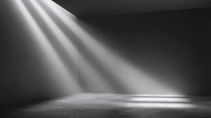A dramatic view of beams of light illuminating a dark room from an unseen source above