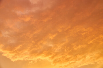 A dramatic fiery golden sky at sunset.