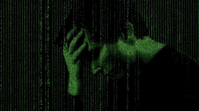 frustrated man silhouette imprisoned in digital life. green matrix codes wandering downwards