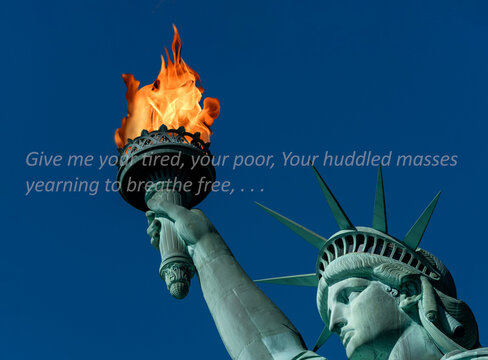 Statue of Liberty with real flames and famous saying about being free