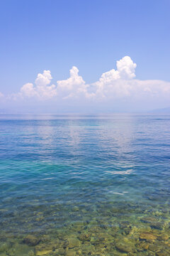 Storm clouds over calm sea