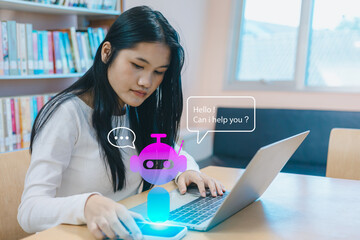 Asian woman using AI chatbot hologram on smartphone and laptop in modern library