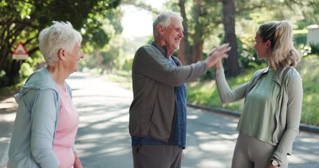 Personal trainer, high five and support with elderly people in park for mobility training, health or workout team. Friends, success and female fitness coach with senior couple in nature for exercise - Powered by Adobe