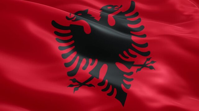 Albanian flag waving majestically in the breeze, embodying national pride and cultural heritage, perfect for travel documentaries and patriotic events