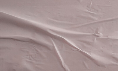 Folded white paper texture backdrop, crumpled poster surface, empty background for text or graphics