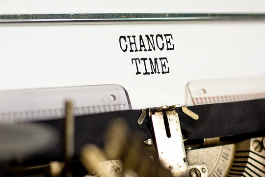 Chance time symbol. Concept word Chance time typed on beautiful old retro typewriter. Beautiful white paper background. Business chance time concept. Copy space.