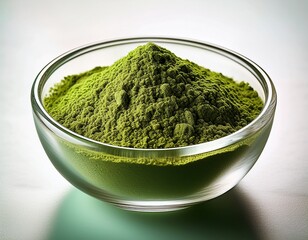 green tea powder in glass bowl