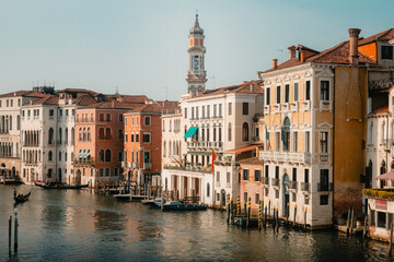 A beautiful row of houses along the Rialto in Venice on a sunny summer day.
