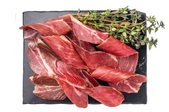Sliced prsut prshut, Balkan cured pork meat ham isolated on white background. top view