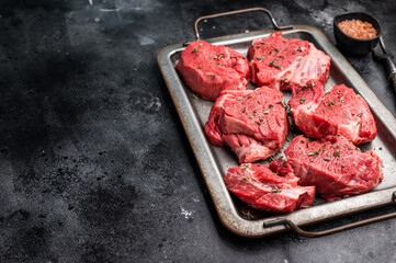 Raw beef boneless shank shin meat with herbs and spices ready for cooking. isolated on white background. top view