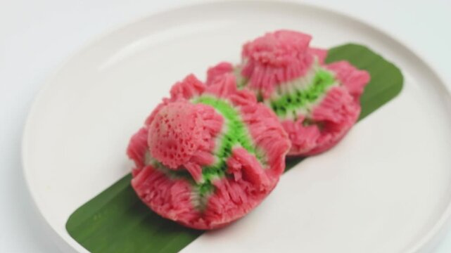 Bikang, the traditional Indonesian cake made from rice flour, eggs and coconut milk is made by baking it in a mold
