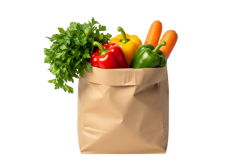 Fresh assortment of colorful bell peppers, carrots, and green parsley spilling out of a brown paper grocery bag, isolated on transparent background