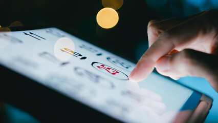 Man Counting Days To Christmas On His Tablet Calendar