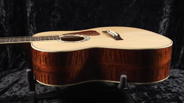 Acoustic guitar showcase showing detailed wood grain and craftsmanship in rotating view