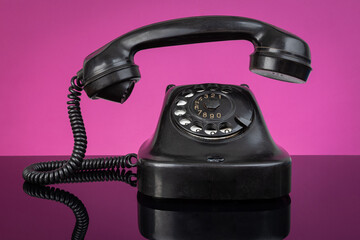 Retro Rotary Telephone with Taken off Receiver. Vintage Communication Concept, Classic Landline Handset, Nostalgic Technology, Creative Pop Art Style Still Life