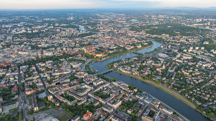 Drone view of Old Town of Krakow, Wawel Castle and river with bridges and boats. Krakow, Poland.