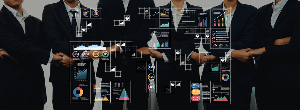 A professional business team stands confidently with arms crossed, surrounded by digital graphs and charts, emphasizing data analysis for impactful decision making. Trope