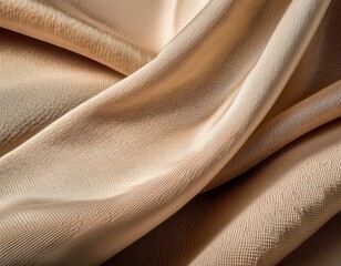 the close up perspective reveals a textured beige fabric surface showcasing its woven pattern and subtle variations in color and light throughout the material