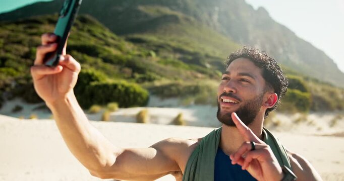 Fitness, man and selfie with peace sign at beach for exercise blog, social media post or memory. Workout influencer, person and emoji with photography on seashore for profile picture or cardio update