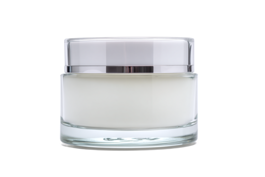 Clear glass jar of white cream with silver lid, isolated on transparent background