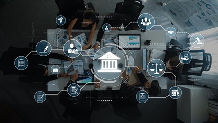 This image features an aerial view of a business meeting surrounded by digital symbols that showcase innovation, collaboration, and effective communication strategies in the workplace. Raster