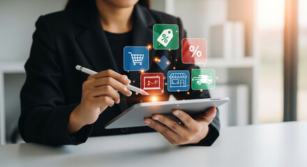 E-commerce management: a professional uses a tablet with a stylus, interacting with digital icons for online shopping, sales, discounts, and delivery services.