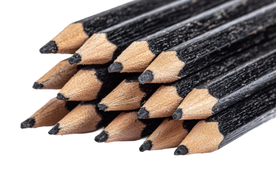 Closeup of a stack of black graphite pencils, sharpened and ready for use, isolated on transparent background
