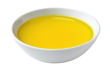 Bright yellow liquid in a white bowl, isolated on transparent background