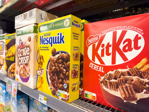 Villach, Austria - November 25, 2025: Nestle cereal boxes including KitKat and Nesquik displayed on supermarket shelf, showcasing colorful packaging and variety of breakfast options