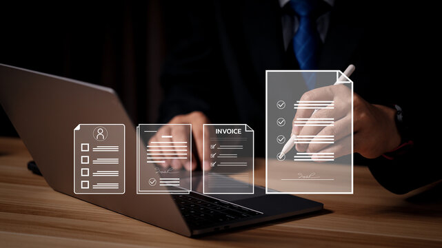 Businessman signing electronic invoice document with stylus pen on virtual screen. Concept of digital billing payment, paperless financial transaction and online tax system.