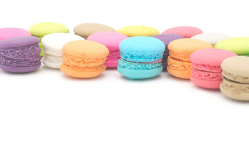 Colorful mini macaroons isolated on white background
