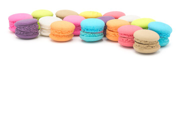 Colorful mini macaroons isolated on white background