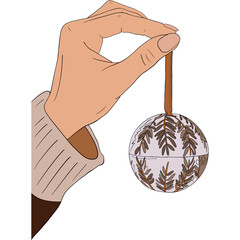 Hand holding christmas ornament