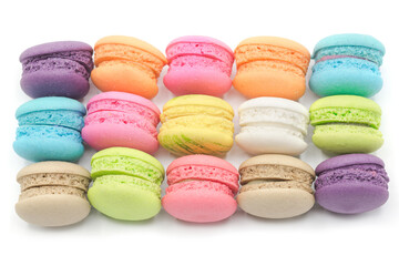 Colorful mini macaroons isolated on white background