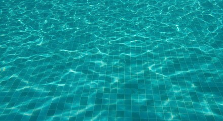 Obraz premium The abstract patterns of light on the bottom of a pool.