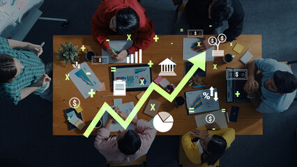 A dynamic scene featuring diverse professionals engaged in a business strategy meeting. The image includes a growth graph and financial icons, symbolizing success and collaboration. Trope