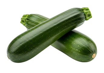 Two fresh, dark green zucchini vegetables crossed over each other, isolated on transparent background