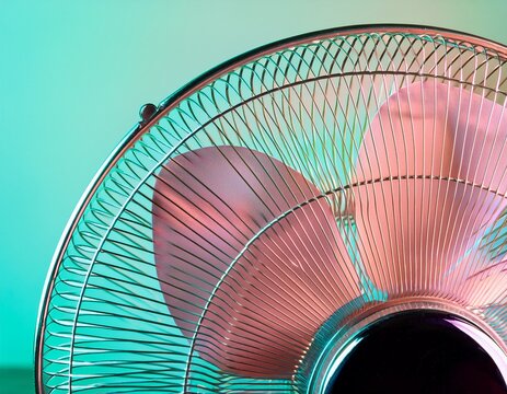 pastel colors iridescent texture highlights an electric fan ideal for product staging ads or social media