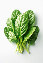 Food photo. Fresh spinach leaves top view on a light gray background. Natural texture, realistic , green color, clean food photography composition and healthy plant-based ingredient concept.