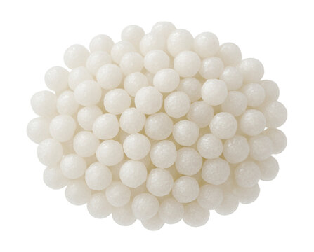 Urea granules for enhancing concrete workability in freezing conditions.