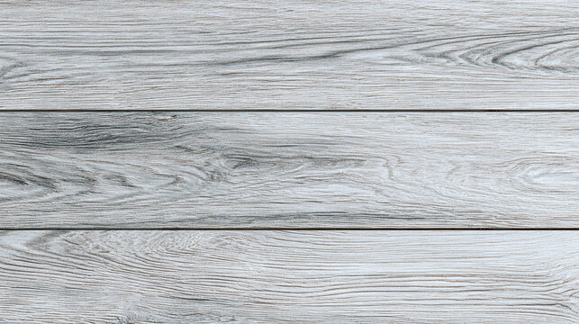 Close-up of a weathered wooden plank surface. The detailed wood grain creates a tactile texture